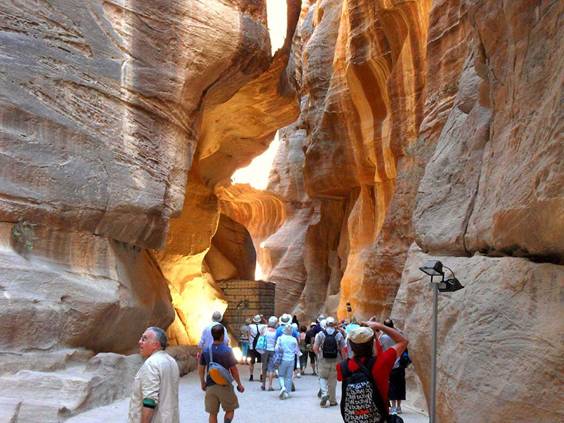 https://doctorwoodhead.com/wp-content/uploads/2021/07/Siq-canyon-passageway-ruins-Jordan-Petra.jpg